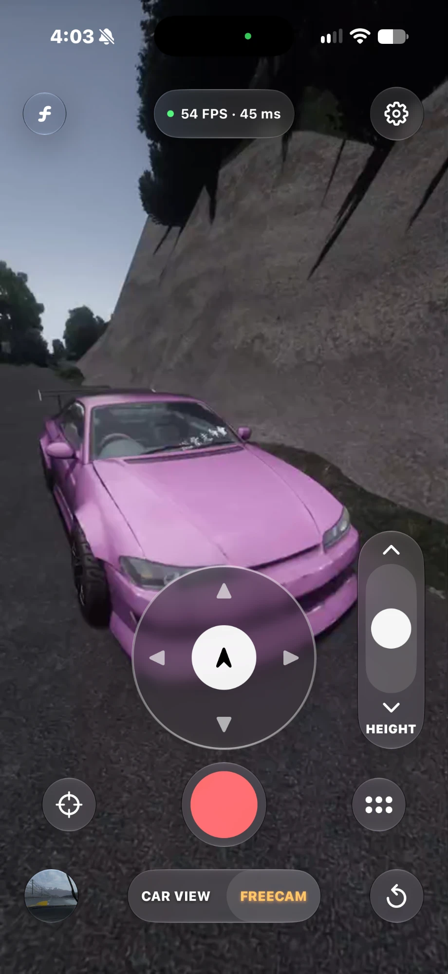 Freecam in the RealCam app: a car framed from outside, with the joystick and the height slider